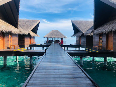 Adaaran Prestige Ocean Villas overwater villa — lagoon