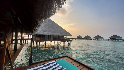 Adaaran Rannalhi Water Villas overwater villa — lagoon