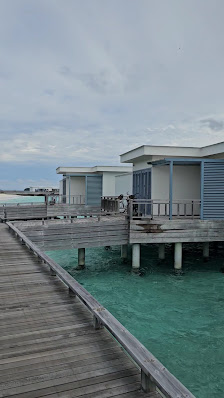 Amilla Maldives overwater villa — deck
