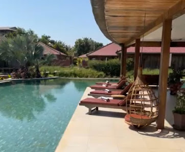 Authentic Khmer Village Resort overwater villa — interior