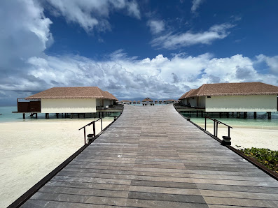 Cinnamon Velifushi Maldives overwater villa — lagoon