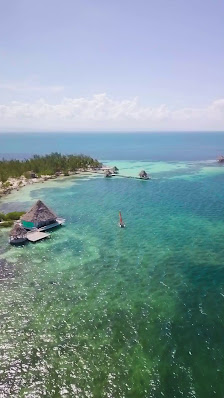 Coco Plum Island Resort overwater villa — deck