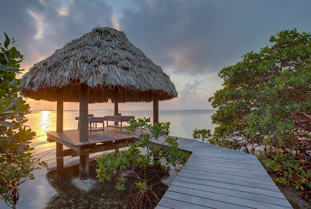 Coco Plum Island Resort overwater villa — aerial