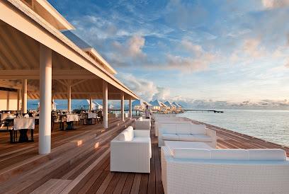 Diamonds Athuruga Maldives — overwater bungalow