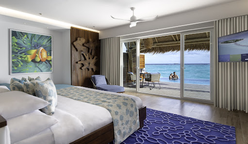 Emerald Maldives Resort & Spa overwater villa — aerial