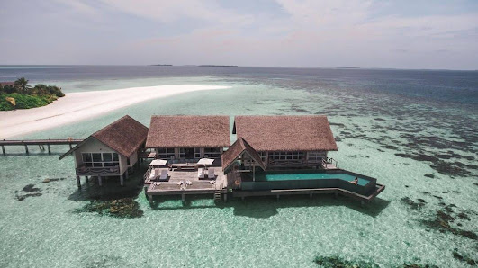 Four Seasons Maldives Private Island at Voavah overwater villa — lagoon
