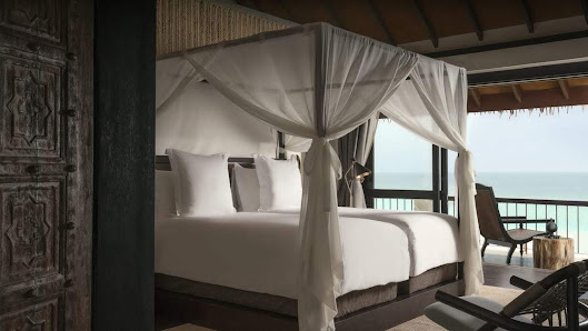 Four Seasons Maldives Private Island at Voavah overwater villa — interior