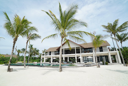 Four Seasons Maldives Private Island at Voavah overwater villa — aerial
