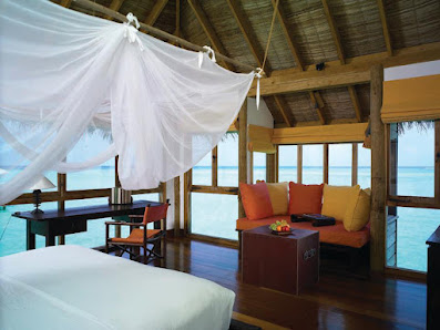 Gili Lankanfushi Maldives overwater villa — aerial