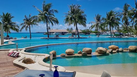 Holiday Inn Resort Kandooma Maldives by IHG overwater villa — deck