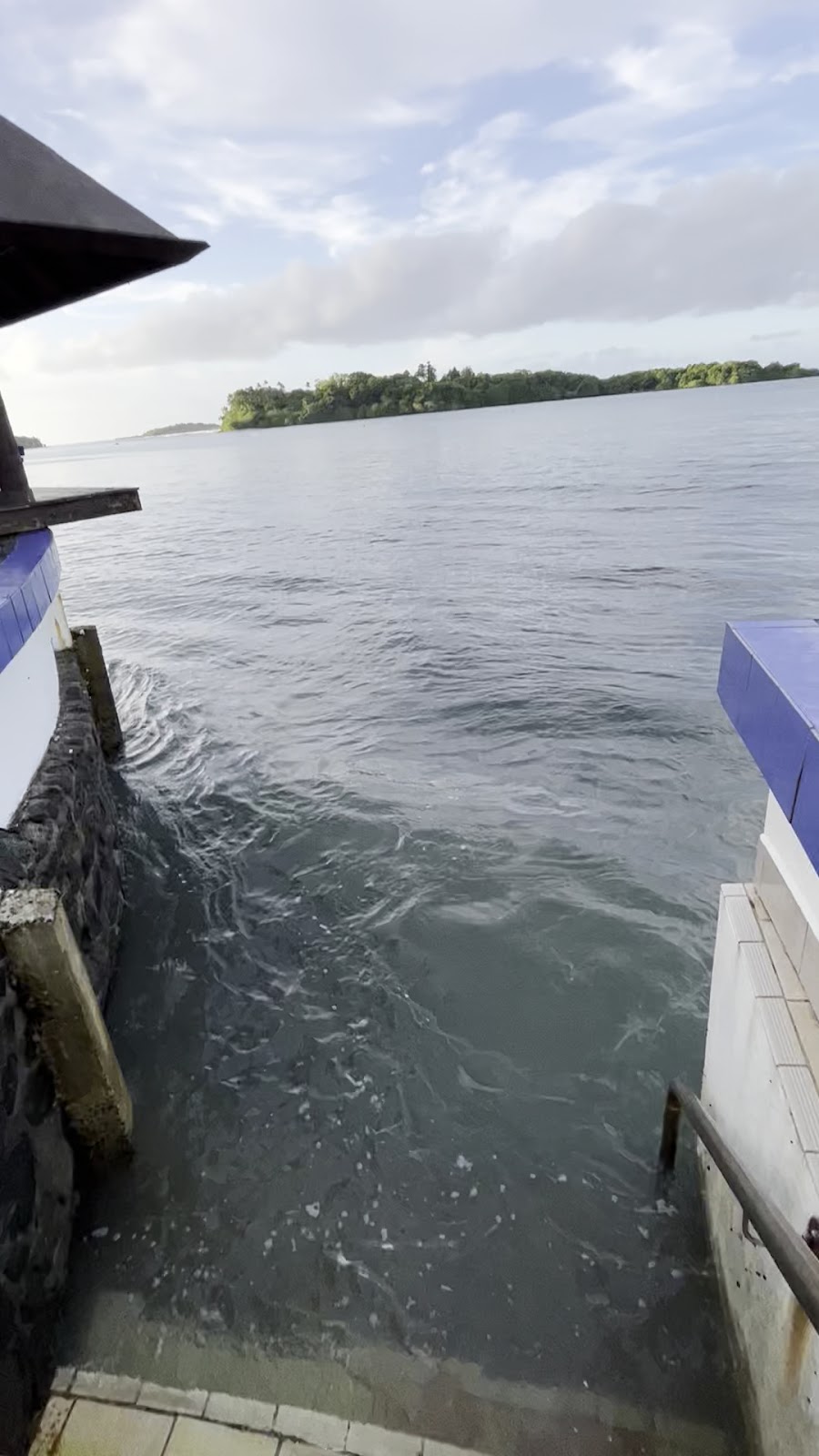 Koro Sun Resort overwater villa — lagoon