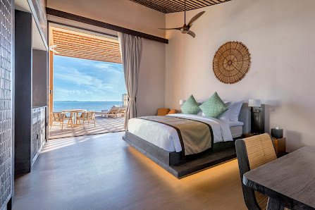 Kudadoo Maldives Private Island overwater villa — deck