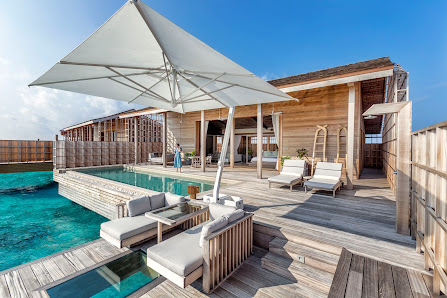 Kudadoo Maldives Private Island overwater villa — aerial