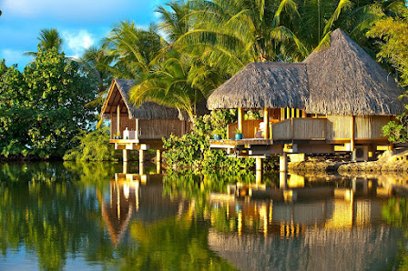 Le Taha'a by Pearl Resorts overwater villa — lagoon