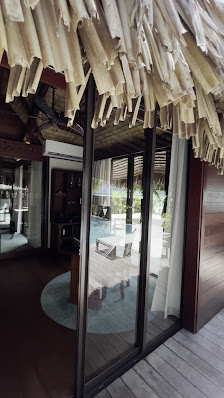 Le Taha'a by Pearl Resorts overwater villa — deck