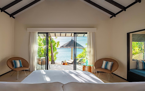 NH Collection Maldives Havodda Resort overwater villa — aerial