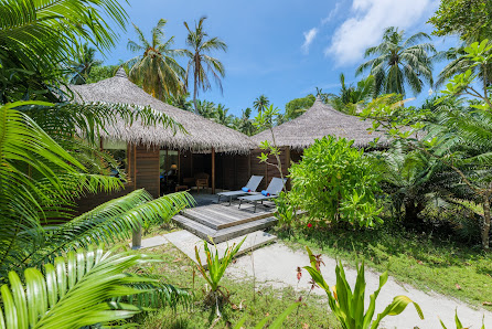 Niva Kuramathi Maldives overwater villa — lagoon