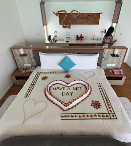 Niva Kuramathi Maldives overwater villa — interior