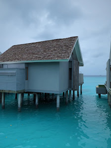 Niva Kuramathi Maldives overwater villa — deck