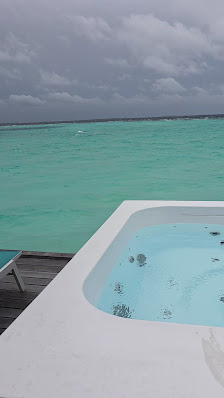 Nova Maldives overwater villa — deck
