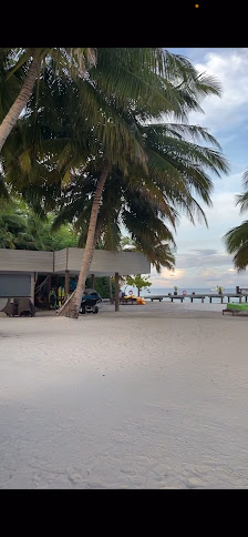 Raffles Maldives Meradhoo overwater villa — deck