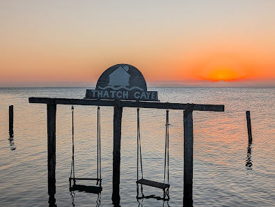 Thatch Caye Resort, a Muy'Ono Resort overwater villa — interior