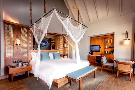 The Centara Collection, Machchafushi Island Resort & Spa Maldives overwater villa — deck