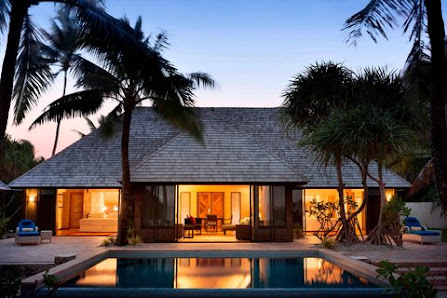 The St. Regis Bora Bora Resort overwater villa — lagoon