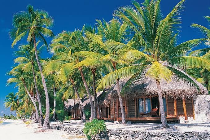 Le Tikehau by Pearl Resorts overwater villa — interior