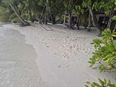 Vilamendhoo Island Resort & Spa overwater villa — interior